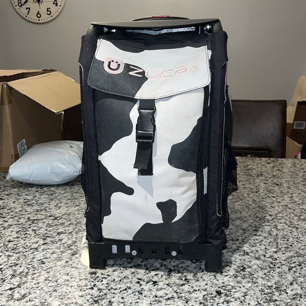 ZUCA roller bag in cow print USED
